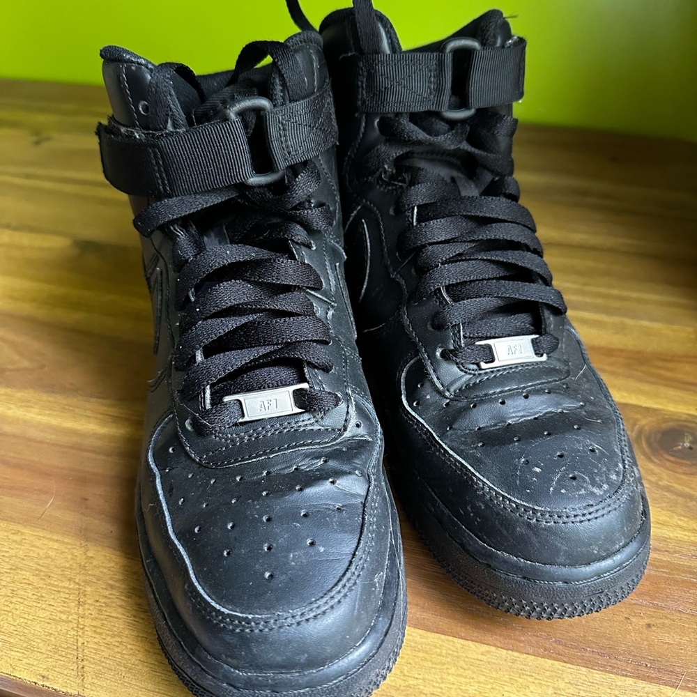 Black High-top Nike Air Force 1s